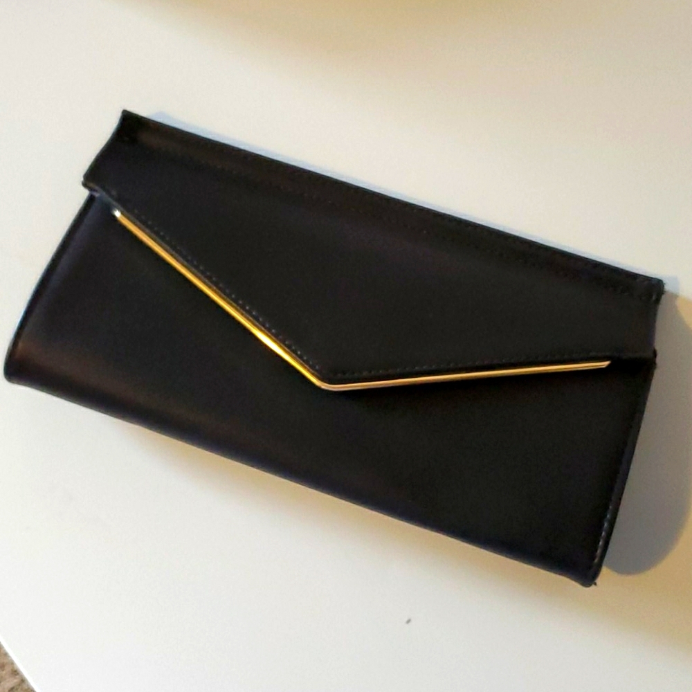 Black envelope clutch with gold hardware
